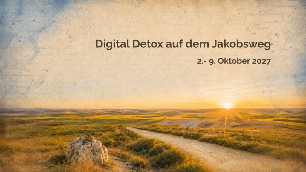 Blick über die spanische Hochebene mit aufgehender Sonne. Darauf der Text "Digital Detox auf dem Jakobsweg. 2.-9. Oktober 2027"